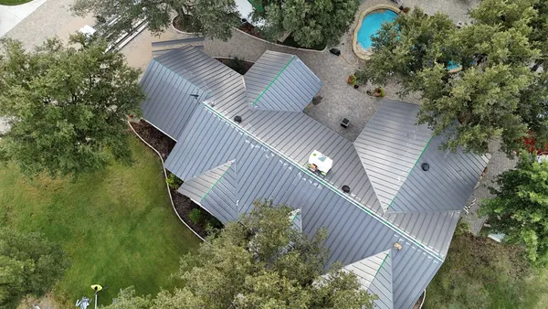 Professional roof replacement by Apex Premier Roofing - showcasing expert installation of a new residential roof in DFW